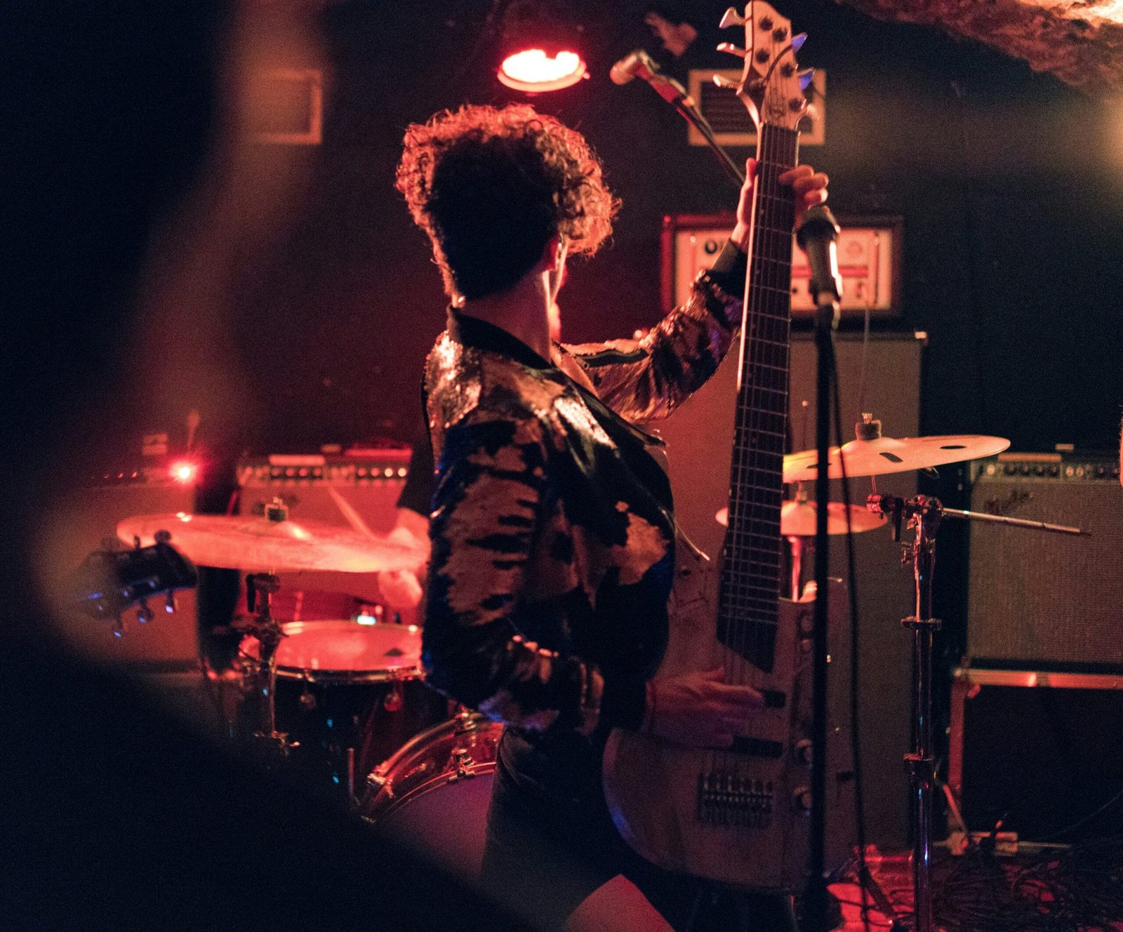 man holding electric guitar
